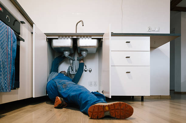Professional Drain Cleaning technician working in Newport News, VA